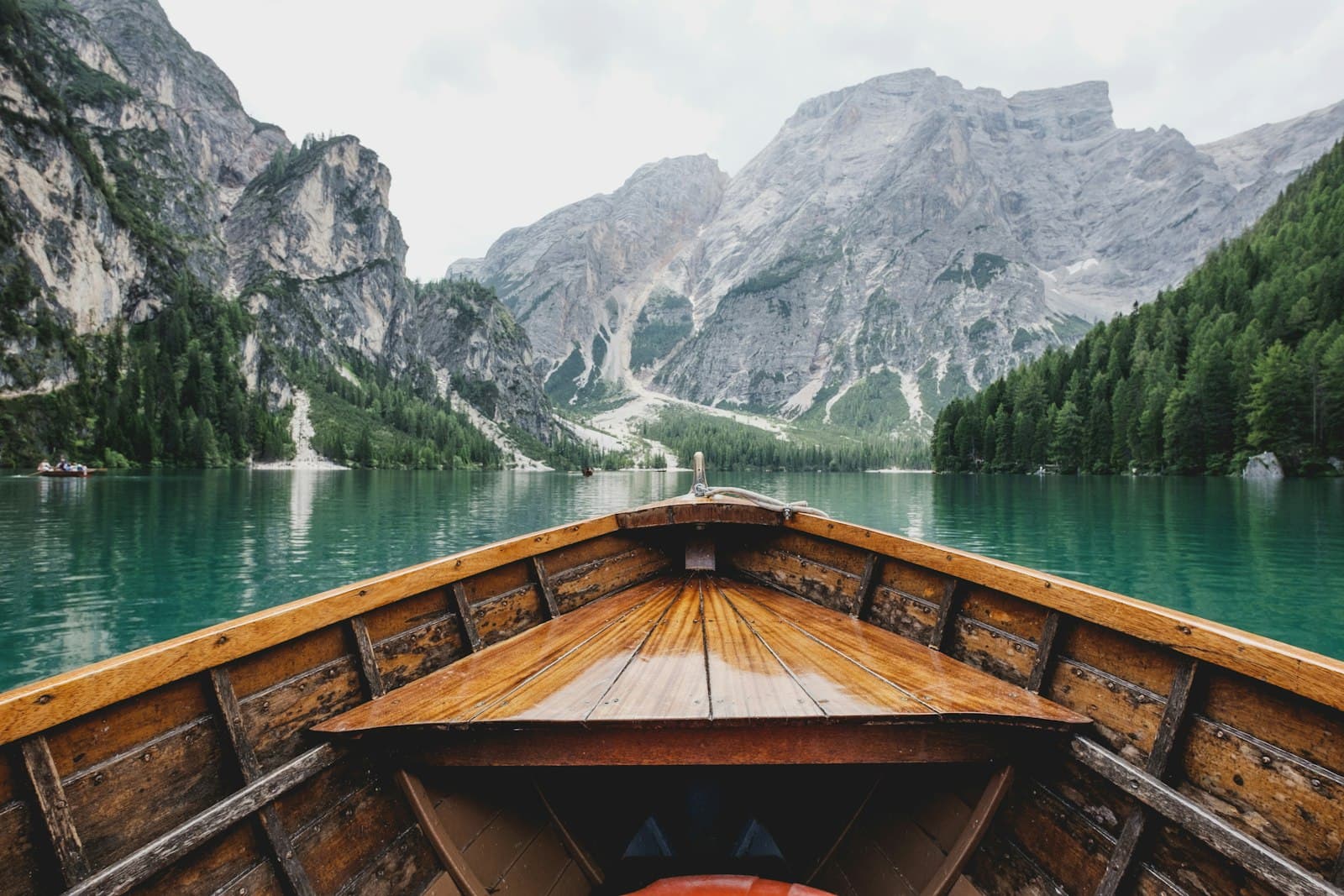 Boat ride across a calm mountain lake